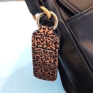 Chapstick or lipstick holder. For keychain or purse.